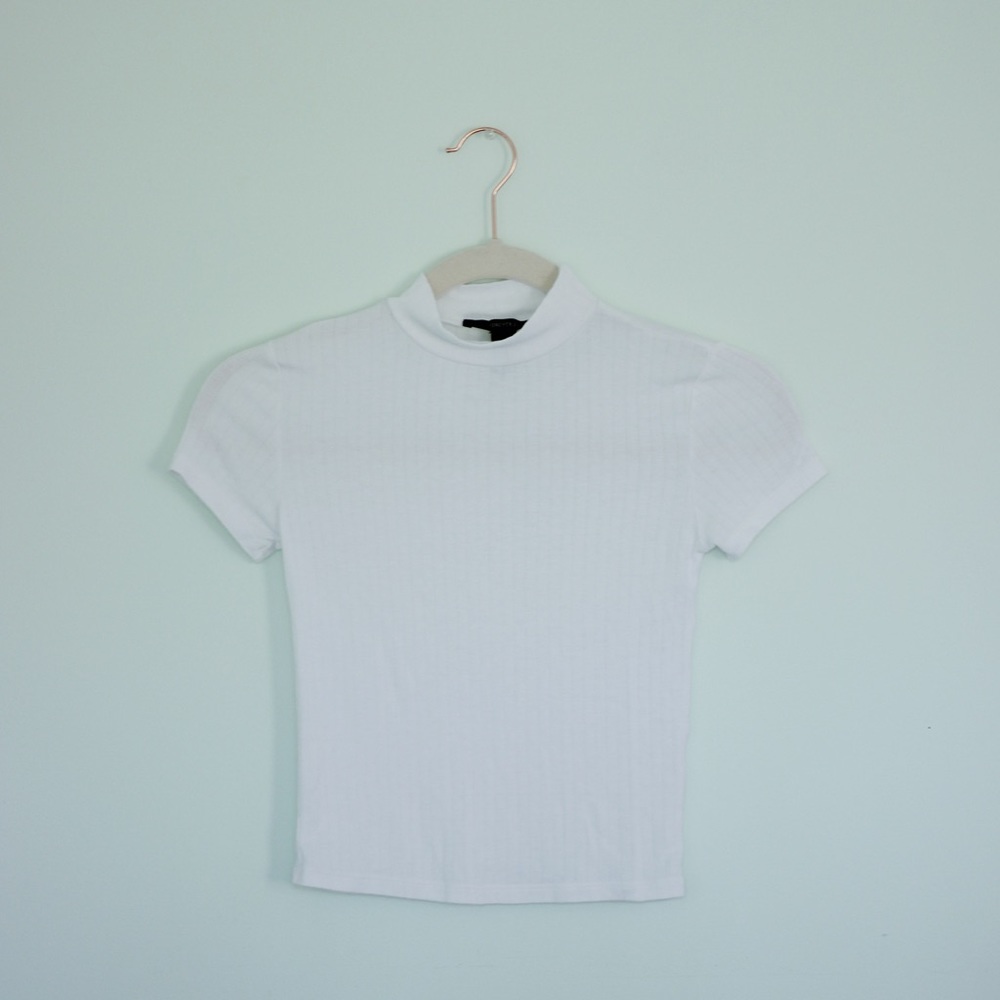 White mock neck top
